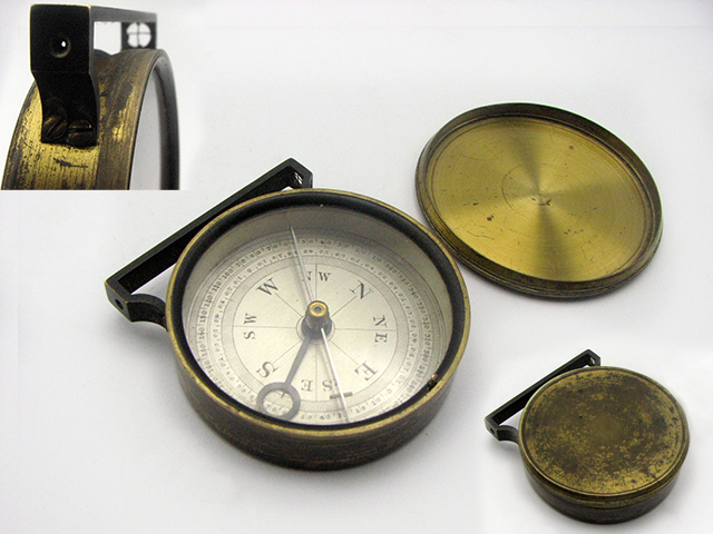 Handle compass with sight arm in upright position